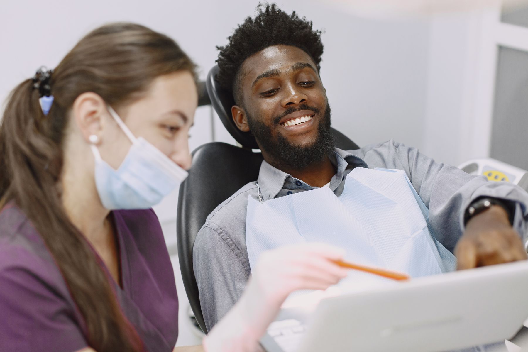 Smiling patient during a dental appointment